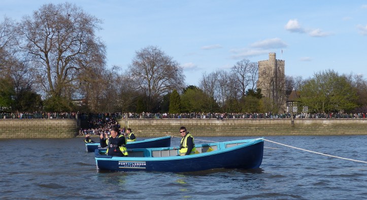 The stake boats at the start.