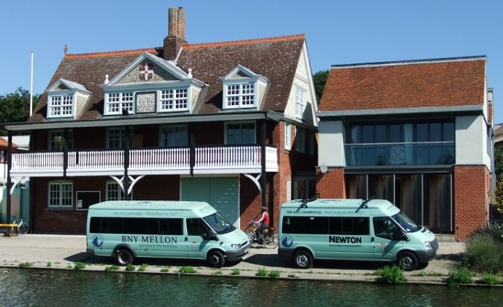 Goldie Boathouse in 2013 with minibuses sponsored by Mellon and Newton.