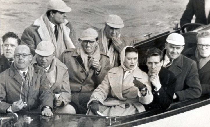 Princess Margaret talking to her then fiancé, Antony Armstrong-Jones, aboard the Cambridge launch during the 1960 Oxford - Cambridge Boat Race. Oxford won.