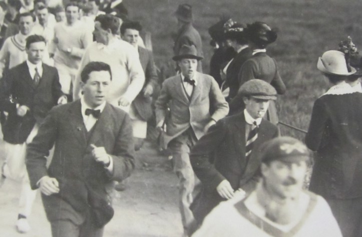 Oxford students following a race during Eights Week, 1913. Picture reproduced by kind permission of Magdalen College.