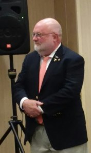 Rowing historian Thomas E. Weil waiting for his turn to draw the lane for Yale's crew in the Varsity race.