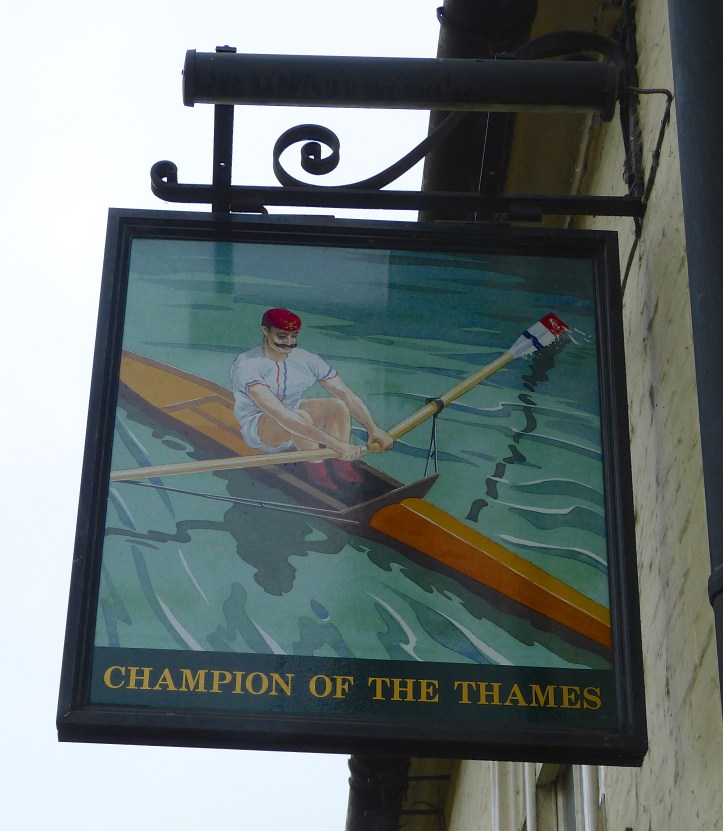Pic 13. The pub sign for the Champion of the Thames. Whoever the ‘Champion’ was, this picture incorrectly shows a ‘gentleman amateur’ and not a working class, professional waterman. He also needs to sort out his peculiar riggers.