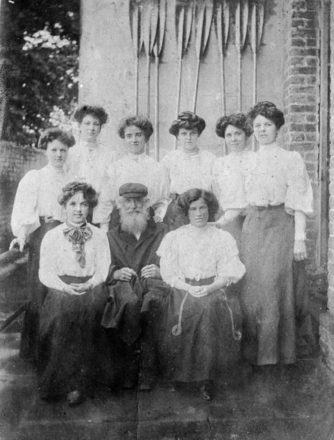 Frederick Furnivall (1825-1910) with some young ladies.