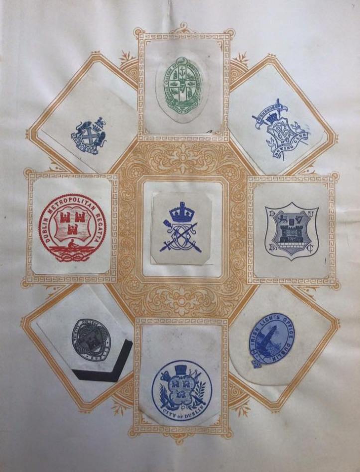 Nine Dublin Crests: Duke of Leinster, Royal College of Surgeons in Ireland, Pembroke Rowing Club. Dublin Metropolitan Regatta, Lord Mayor of Dublin, Dublin University Bi (?) Club. Trinity College Dublin, Lord Mayor of Dublin, Commissioners of Irish Lights (Dublin Office).