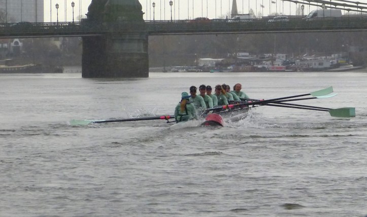Pic 3b. Approaching Hammersmith Bridge both crews were close to Surrey and the Tideway cox, Olivia Godwin, struck a navigation buoy, something which must have further unsettled her already pressured crew. 