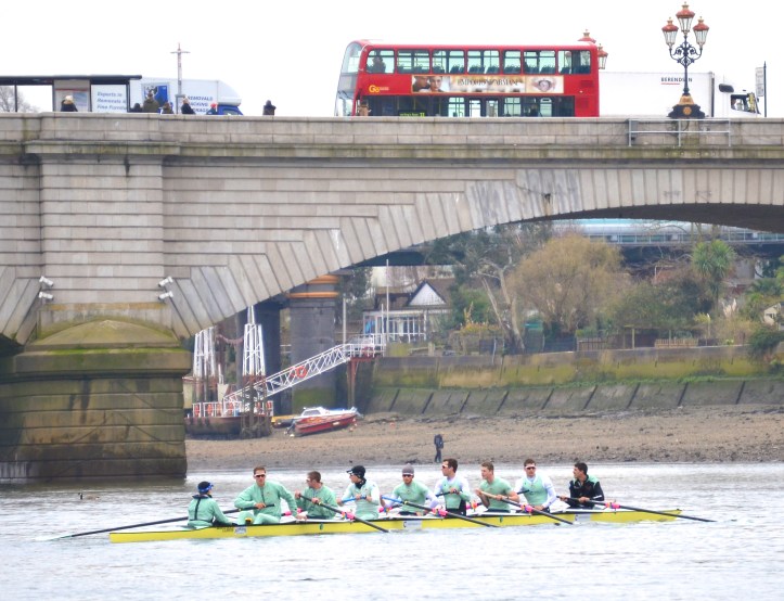 Pic 5. It is compulsory to wait for a London Bus to pass overhead before taking a picture of a crew under a bridge – Putney Bridge and a number 93 in this case.