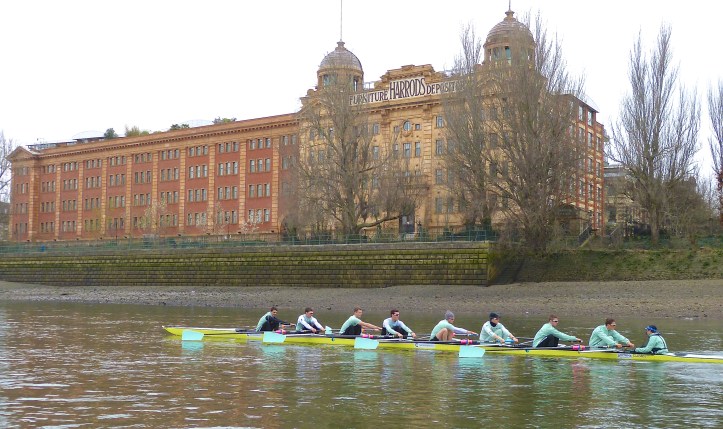 Pic 8. Passing Harrods Repository, nowadays luxury flats. In the past, the two flagpoles each had a dark blue or a light blue flag which was raised or lowered to show the respective positions of the crews. 