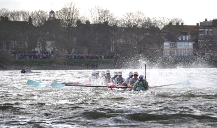 Pic 17. + 18 min 42 sec: Above Barnes Bridge, Cambridge were clearly in serious trouble with their hull barely visible, but modern rules on buoyancy mean that the swamped boat was just about rowable. James 1:12 Blessed is the one who perseveres under trial…..