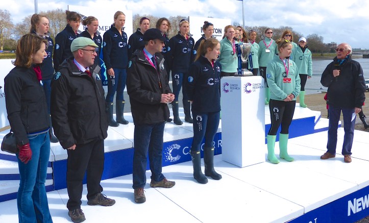 Pic 4. The coin toss for stations. On the far left is Helena Morrissey, CEO of Newton Investment Management and one of the prime movers towards parity between the men’s and women’s races. On her left is David Searle, one of the Executive Directors of the Boat Race Company Ltd (and a Cambridge Blue). On David’s left is the Women’s Race Umpire, Rob Clegg. On the right, with the microphone, is Barry Davies, veteran sports commentator and ‘Voice of the Boat Race’ between 1993 and 2004. Oxford won the toss and chose Surrey.