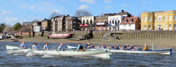 Pic 7. The 2015 Race passing Auriol Kensington Rowing Club at Hammersmith.