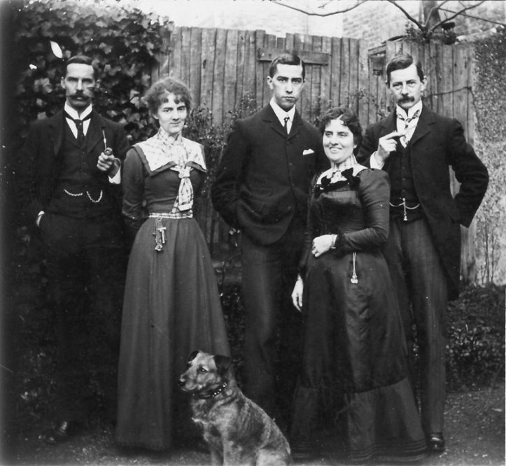 Reginald Bray with family members and the dog he mailed. Courtesy of John Tingey.