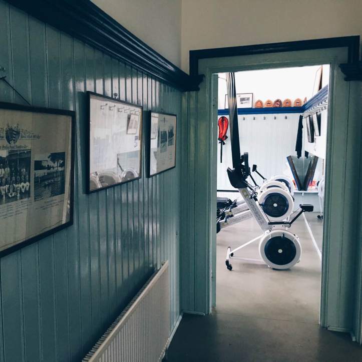 Picture 3: Our suitably-painted hallway. The men’s changing room is on the right, their showers on the left. The women’s room and adjoining showers are to the left of the doorway of the erg room. Photo: CL, with an iPhone 6 and VSCO.