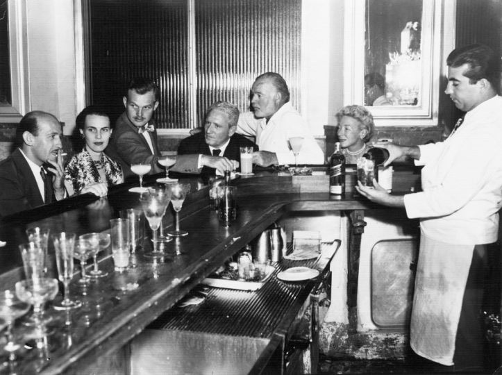 La Floridita, Havana, Cuba. Roberto Herrera, Byra ‘Puck’ Whittlesey, John ‘Bumby’ Hemingway, Spencer Tracy, Ernest Hemingway and Mary Hemingway, circa 1955. From the Ernest Hemingway Photograph Collection. John F. Kennedy Presidential Library and Museum, in Boston.
