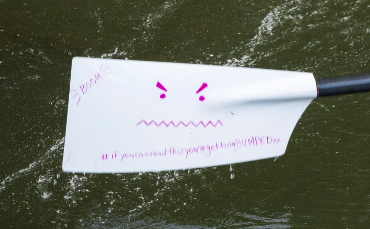 Churchill’s women have pink blades, but one is white for some reason – one cheeky rower has drawn a smiley face on the front. This appeared on the back this year.