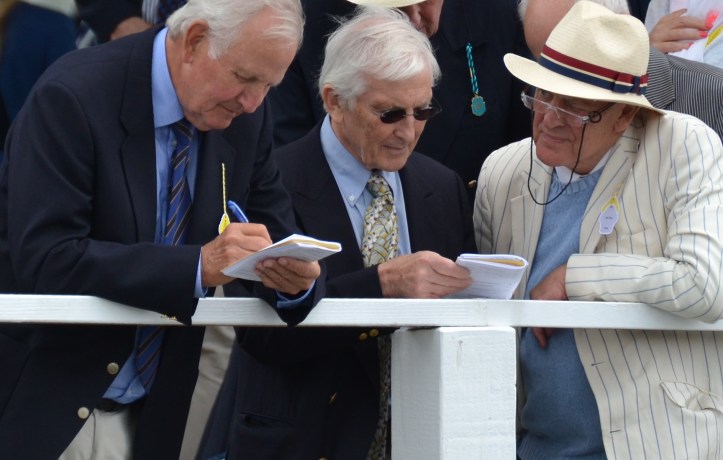 Chris Dodd (centre) and friends study form.