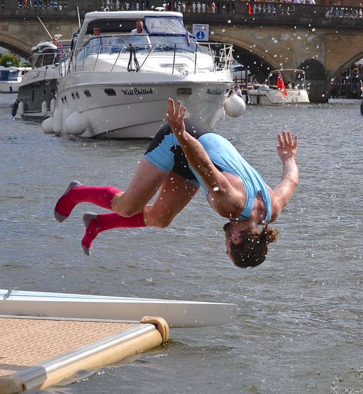 Tierney of Edinburgh University flips at winning the Prince Albert, the first ever Henley win for his boat club.