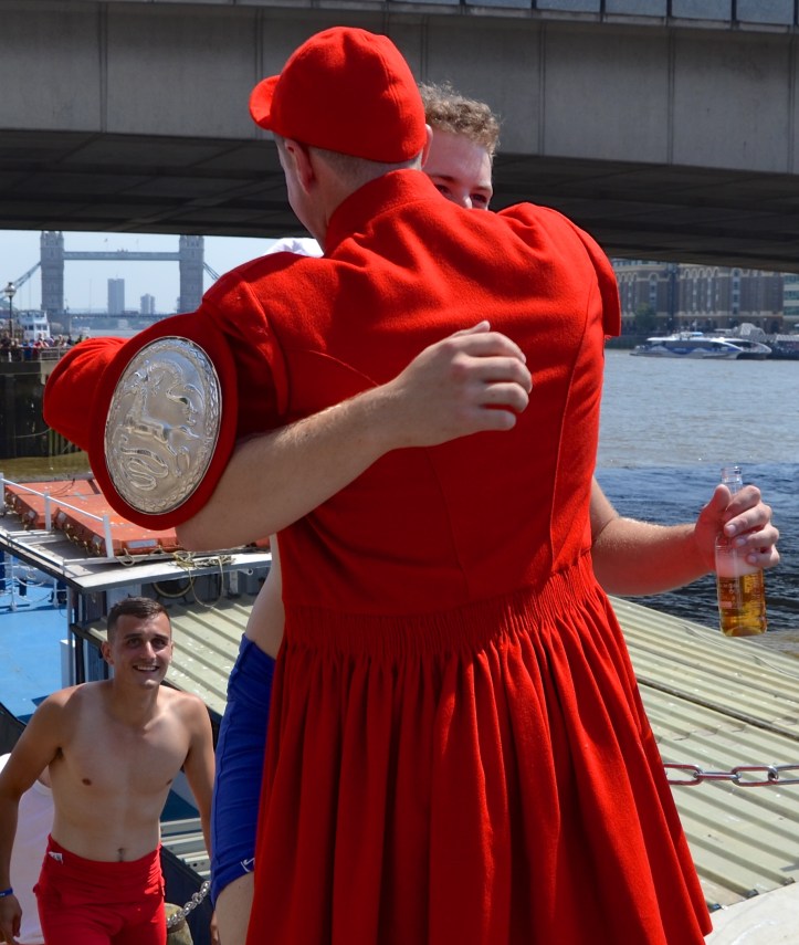 Second-placed Alfie Anderson gets a ‘man hug’ from Louis Pettipher.