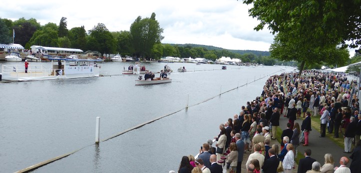 The Regatta stands in silence.