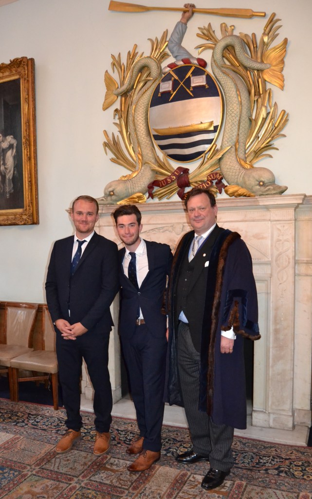 The formal part of the day over, new member of the Company, George McCarthy (centre), poses with cousin Harry (left) and uncle Simon (right). George competed in his first Doggett’s a week later, Harry won the Coat and Badge in 2014, Simon (here in the robes of Junior Warden) in 1984 and his brother, Jeremy, in 1992.