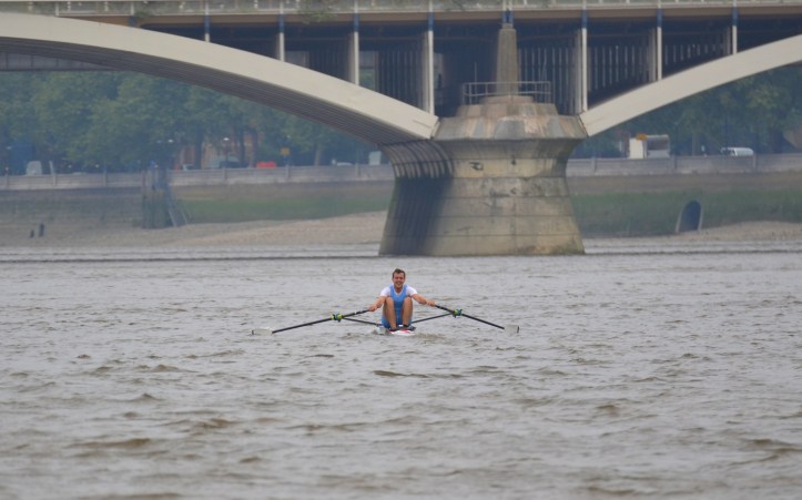 A picture taken during this year’s Doggett’s. The eventual winner, Ben Folkard, is about to go under Grosvenor Bridge (originally known as Victoria Railway Bridge). On the right, on the north bank, are the grounds of the old soldiers’ home, the Royal Hospital Chelsea. In the 18th century this was the site of Ranelagh Gardens.
