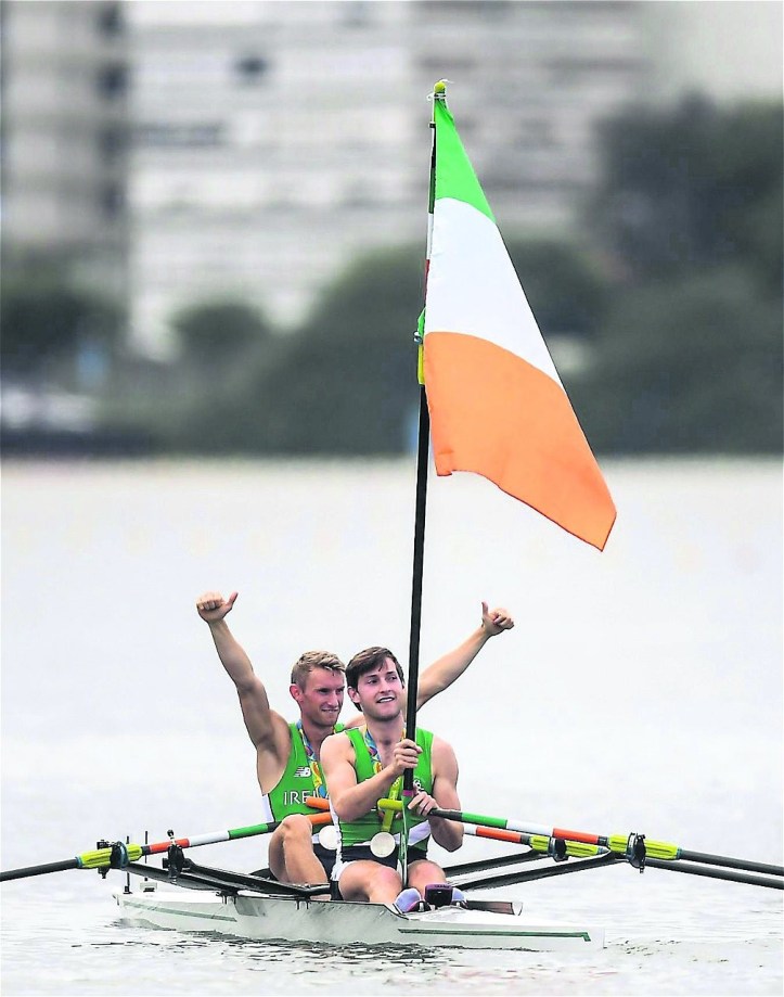 Paul O’Donovan flying the Irish flag after the LM2x Olympic final medal presentation. Gary got to do the same in the Olympic Stadium at the closing ceremony. Photo: Irish Examiner.