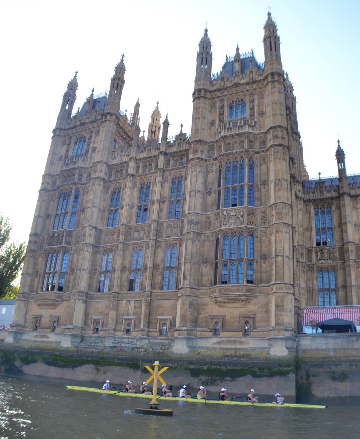 The defeated Thames crew heads for the temporary pontoon moored outside Parliament. Note that if a boat got this close to Parliament in normal circumstances, people with guns would want to know why.