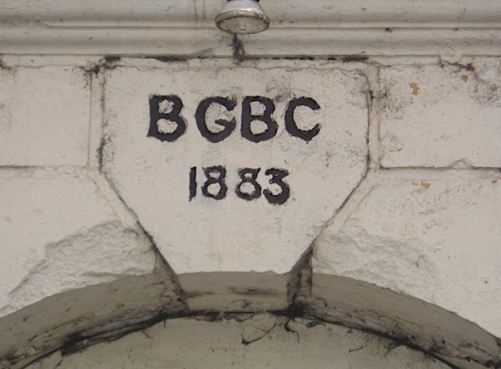 The keystone over a doorway of Skindles Hotel signifying the Brigade of Guards Boat Club. The hotel was closed in 1995 and stood empty until it was demolished in 2015. I hope that this little bit of historic masonry was saved.