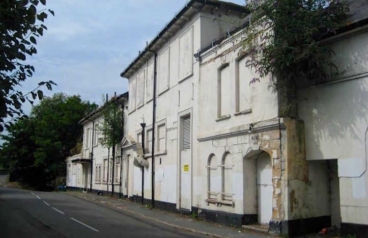 A less common view – the street entrance to Skindles in Mill Lane. Pictured in 2014, just before demolition, the piecemeal development of the complex is clear. The doorway with the BGBC keystone is on the far right and the HBR Report says of the Guards Club building: ‘Though this structure is modest in scale and fairly simple there are clear trappings of the Italianate style popular for mid-Victorian residential developments and some public buildings’.
