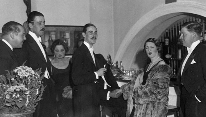 An impertinent photographer interrupts the fun at the Club in 1930.