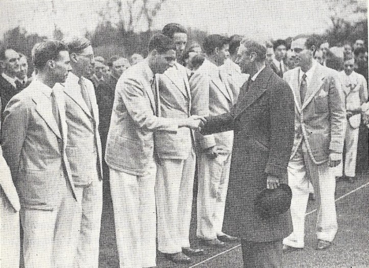James Crowden shaking hands with His Majesty King George VI at a ceremony at King’s College after the Cambridge crew came home from their successful trip to the United States.