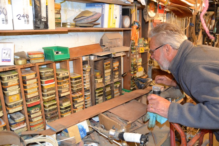 A carefully stored collection of different screws and nails, all with very specific uses.