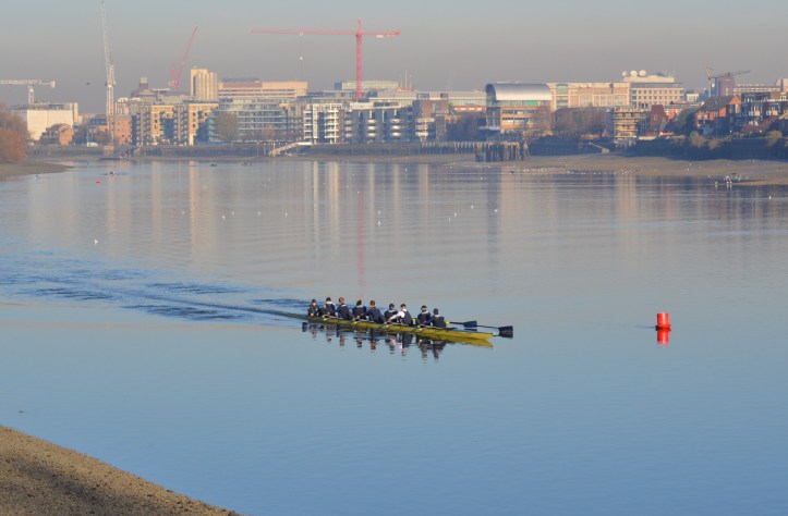 Both men’s boats had an early outing before the women’s race (which went off first). Here “Daniel”, coxed by Victoria Warner and stroked by Vassilis Ragoussis, finds the Tideway at its most beguine. Full crew lists are on the official website, http://theboatraces.org/news-article/288/crews-announced-for-oxford-trial-eights as are the OUBC Squad biographies. http://theboatraces.org/oubc