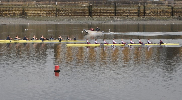 At the Mile Post. With no parallax error in the picture, the Oxford Women clearly lead by nearly a length.